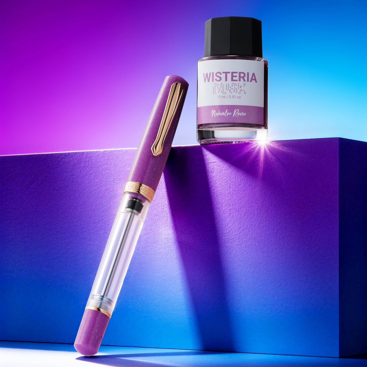 Purple pen and bottle with 'Wisteria' label on a blue and purple gradient background