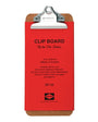 Red clipboard with cork back and metal clip on a white background