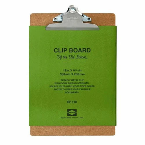 Green clipboard with cork back and metal clip on a white background