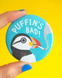 Button badge with puffin design and 'Puffin's Bad!' text on a yellow background