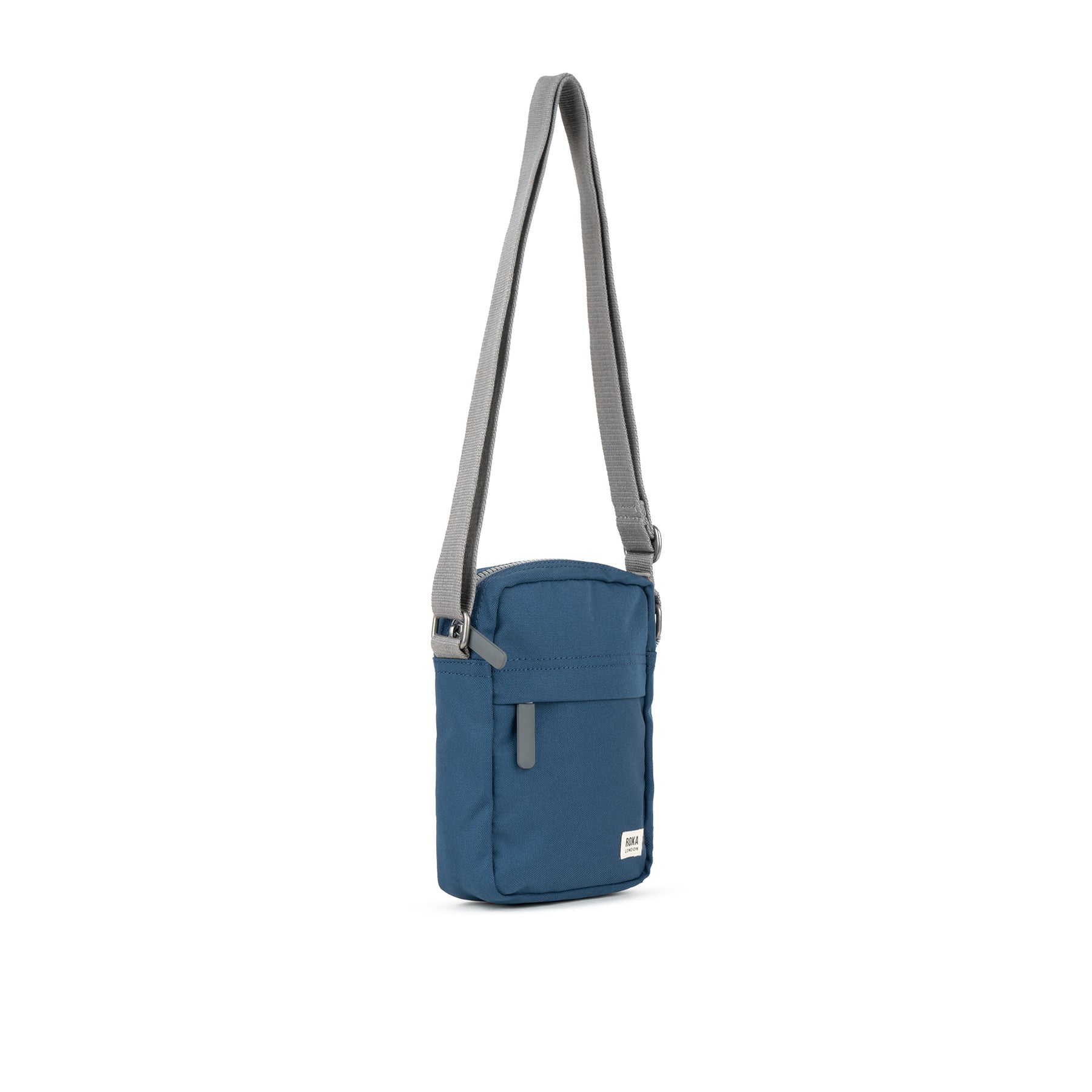 Blue crossbody bag with a gray strap on a white background