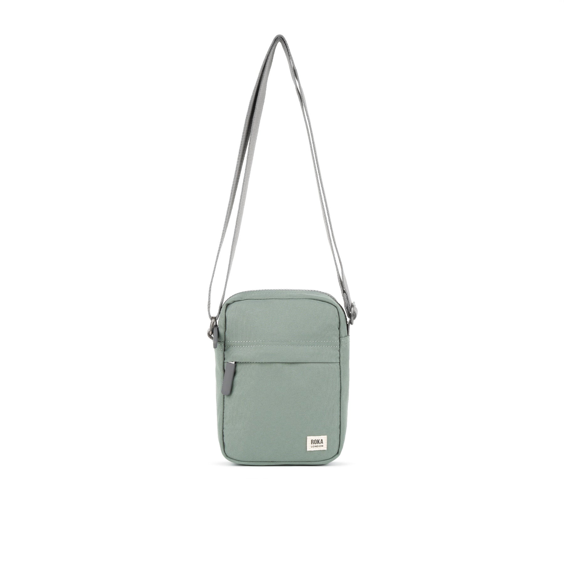 Pewter crossbody bag on a white background