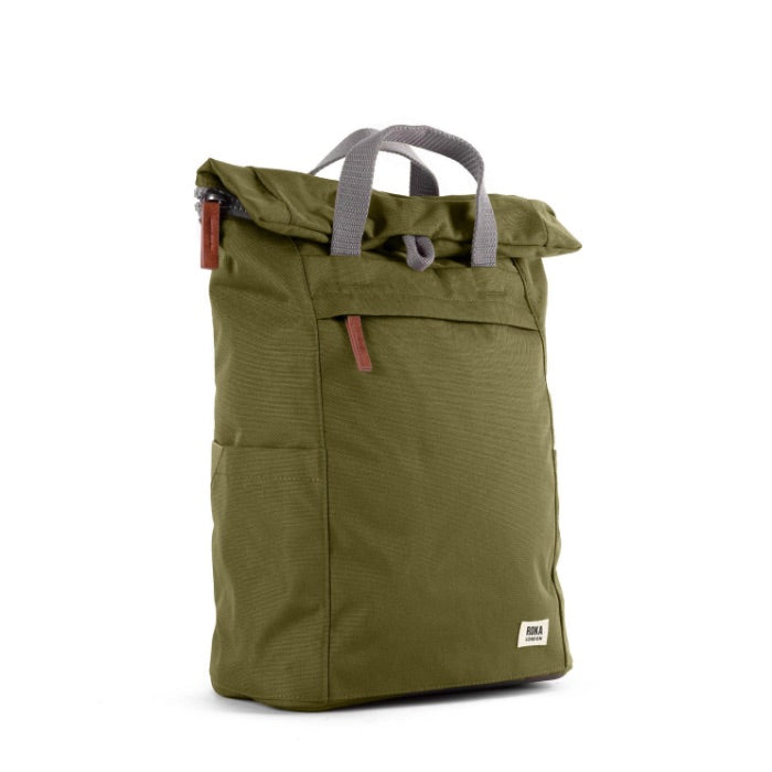 moss coloured backpack in front of a white background