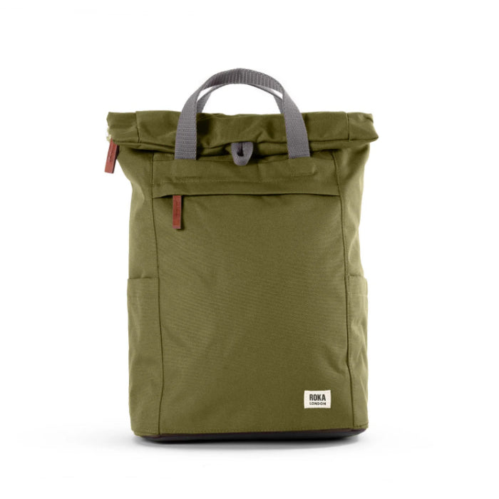 moss coloured backpack in front of a white background