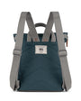 dark grey coloured backpack with grey straps on a white background 