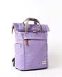 lavender coloured backpack on a white background