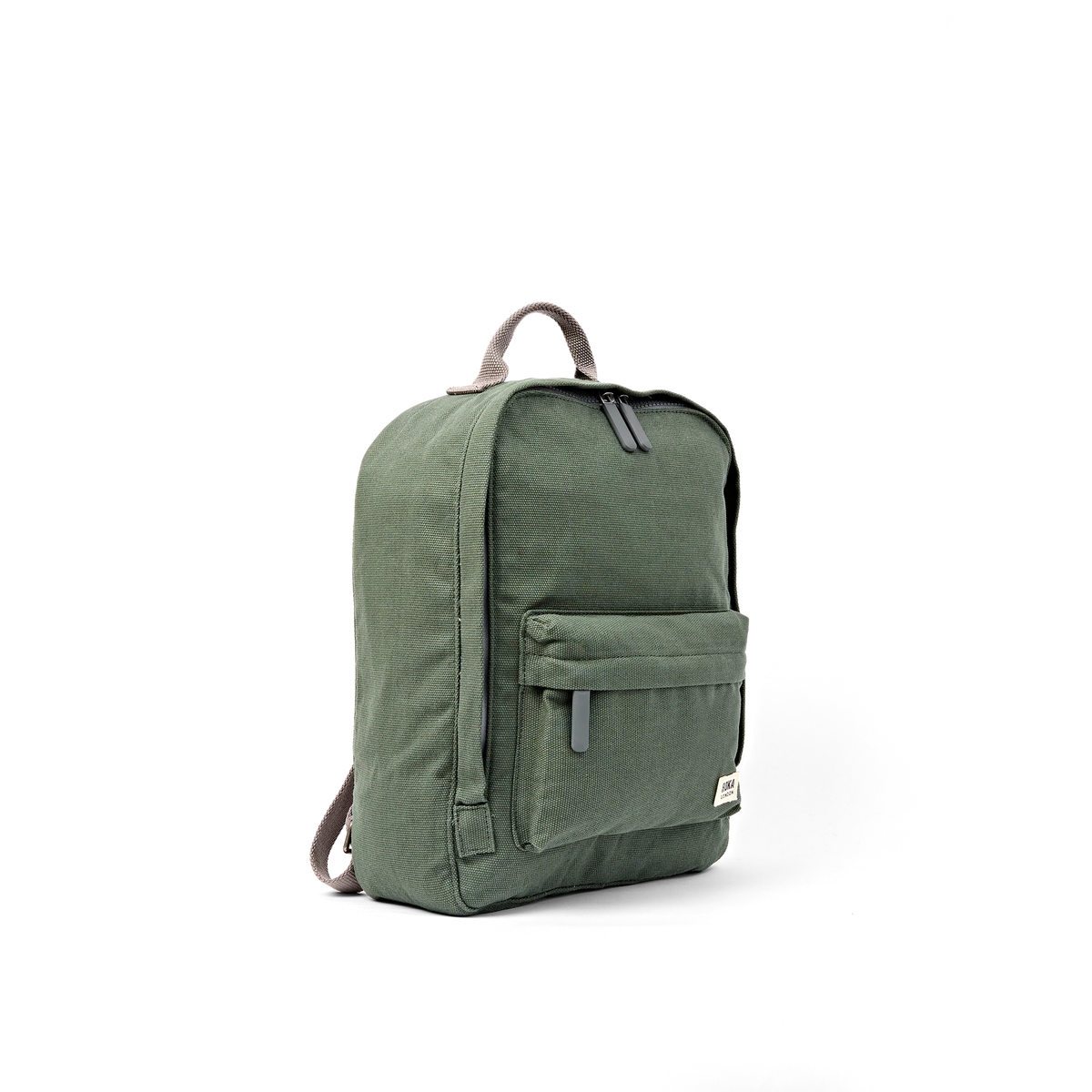 An olive green canvas backpack with a top carry handle, front zippered pocket, and dark gray straps, shown from a three-quarters angle on a white background.