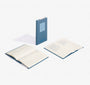 Blue notebook with open pages on a white background