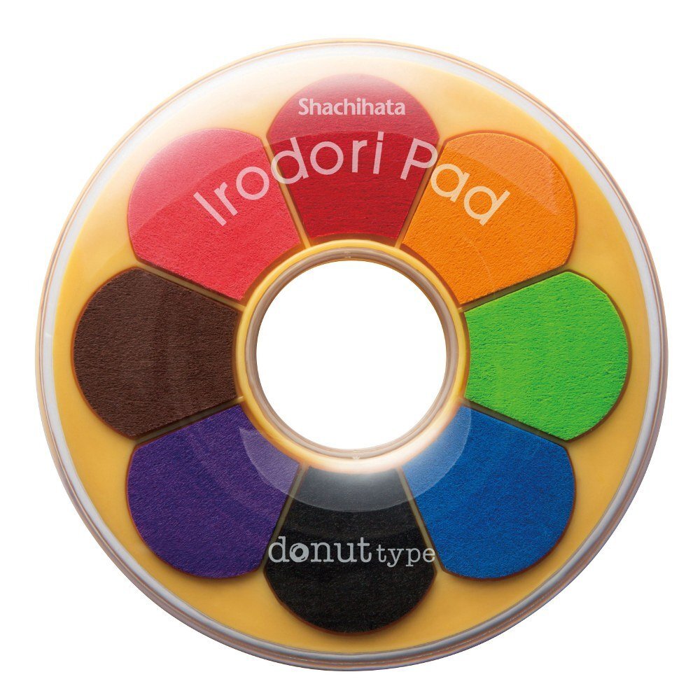 Colorful donut-shaped palette with Shachihata Irodori Pad branding on a white background