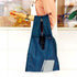 Blue reusable shopping bag held by a person in a kitchen setting