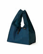 Blue tote bag with a visible brand logo on a white background
