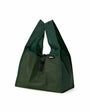 Green reusable shopping bag with mesh side on a white background