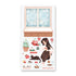 Sticker sheet with a woman, cat, and various items in front of a snowy window