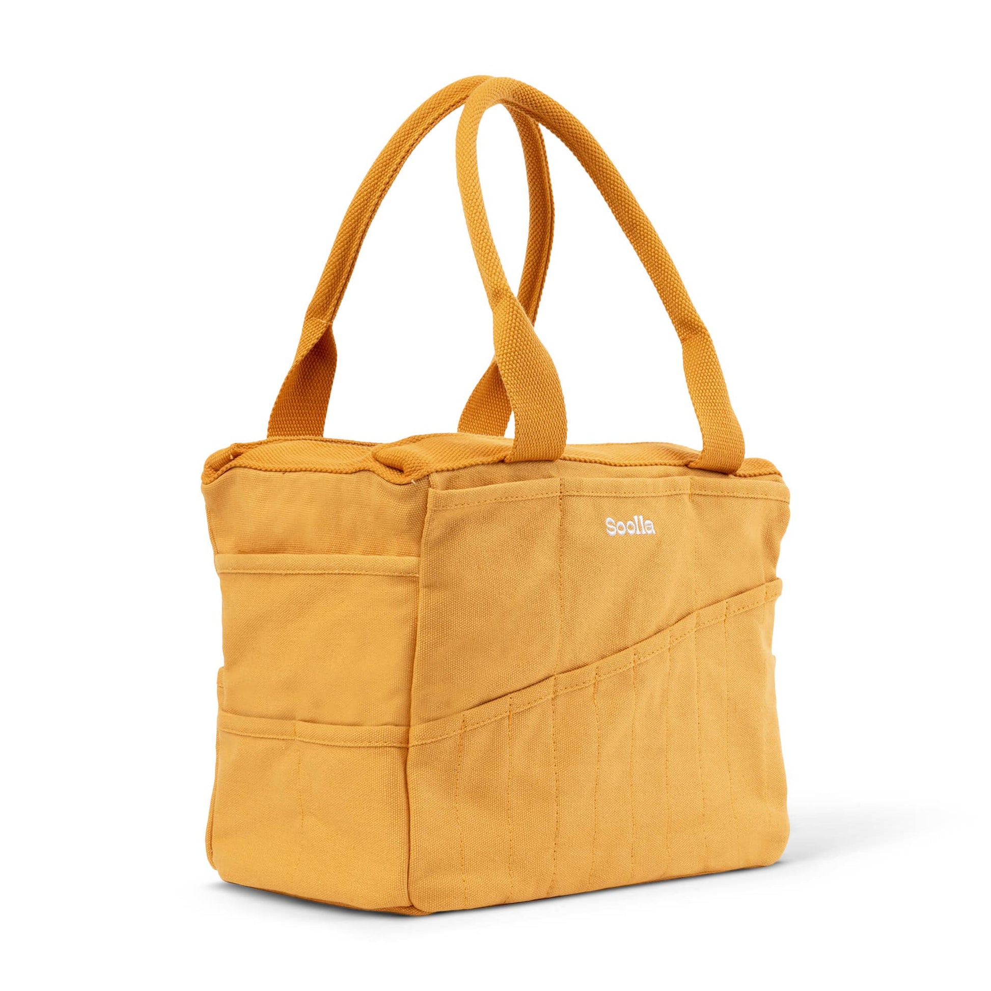 Yellow tote bag with a visible brand logo on a white background