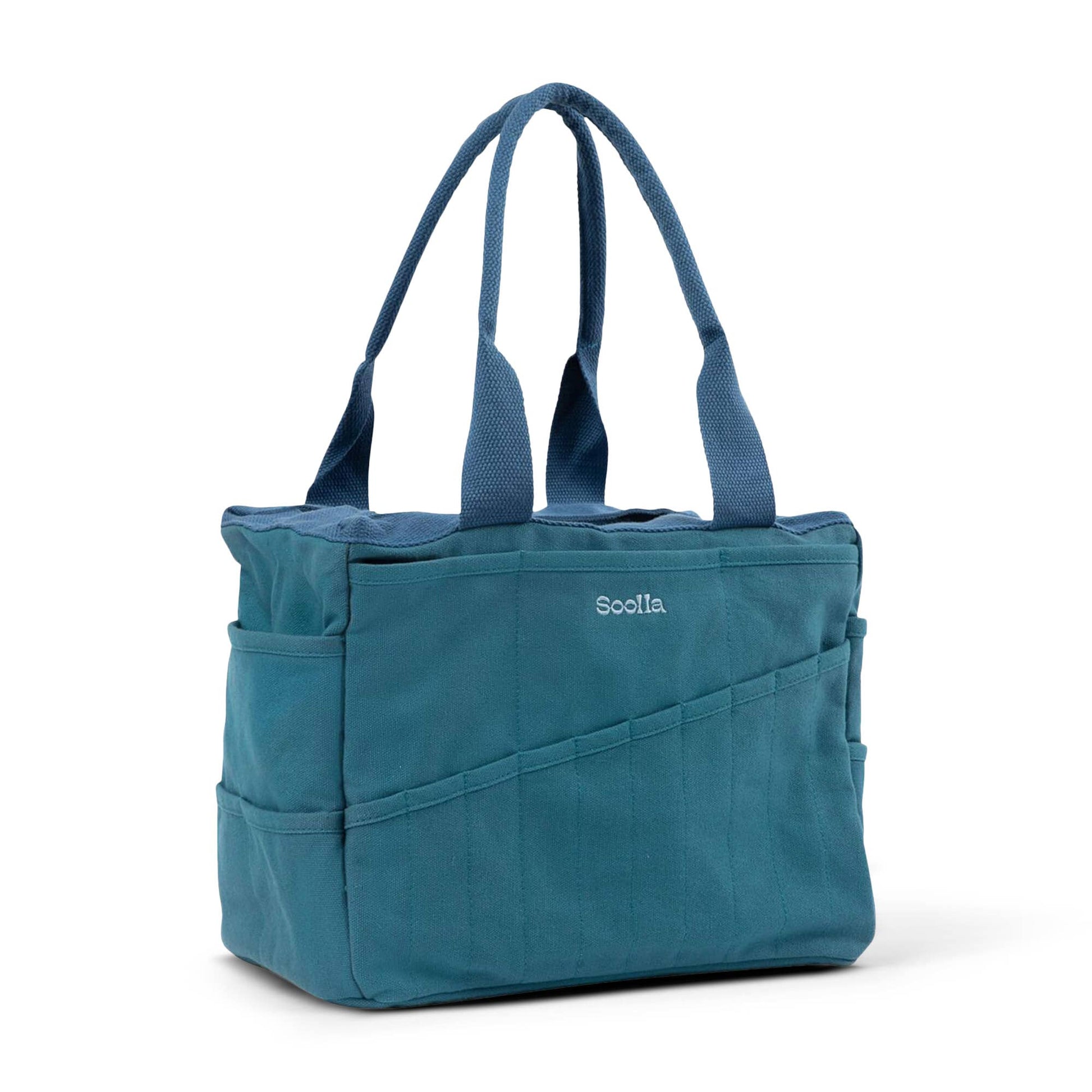 Blue tote bag with 'Socca' branding on a white background