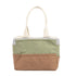 Two-tone green and brown tote bag on a white background