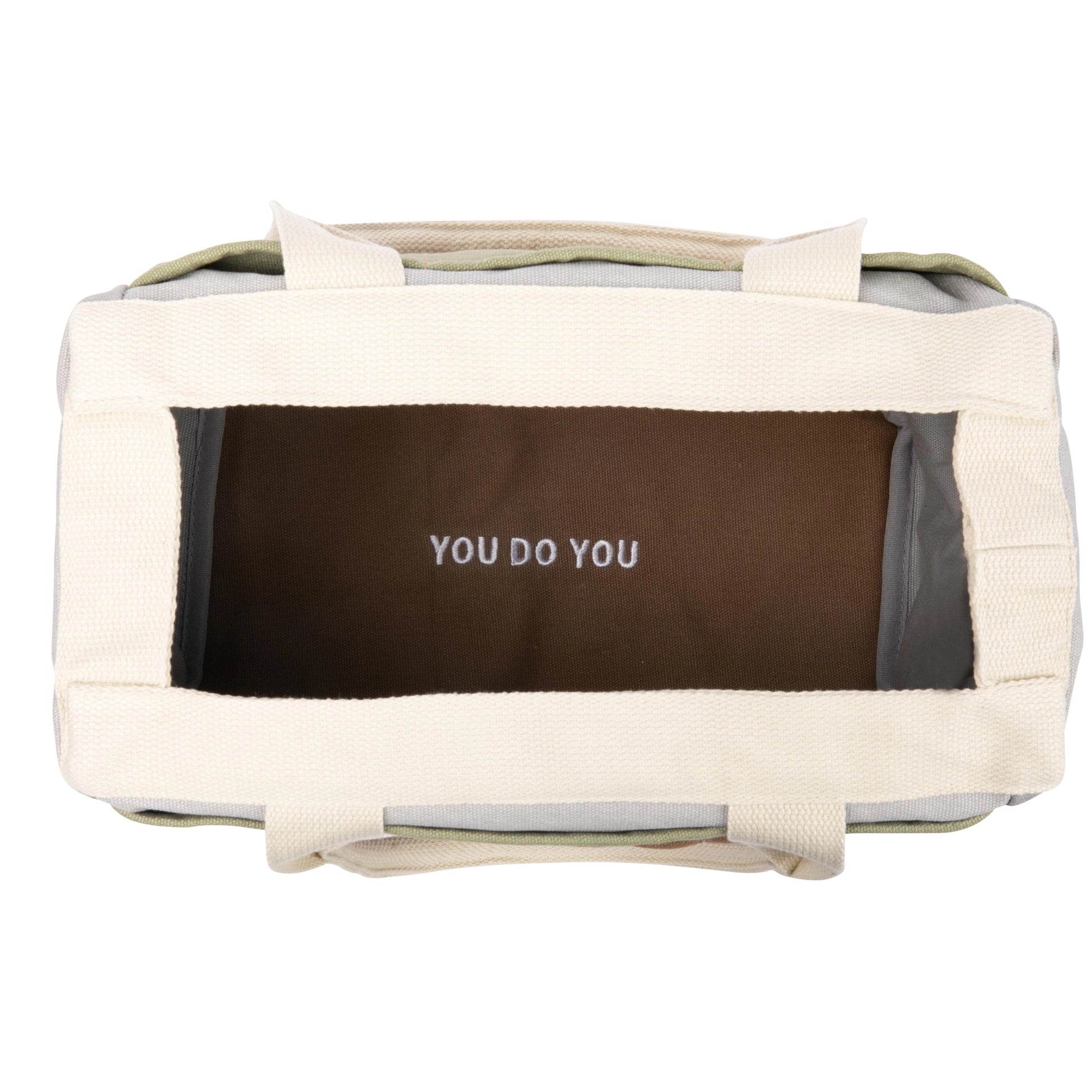 Pet carrier with 'YOU DO YOU' branding on a white background