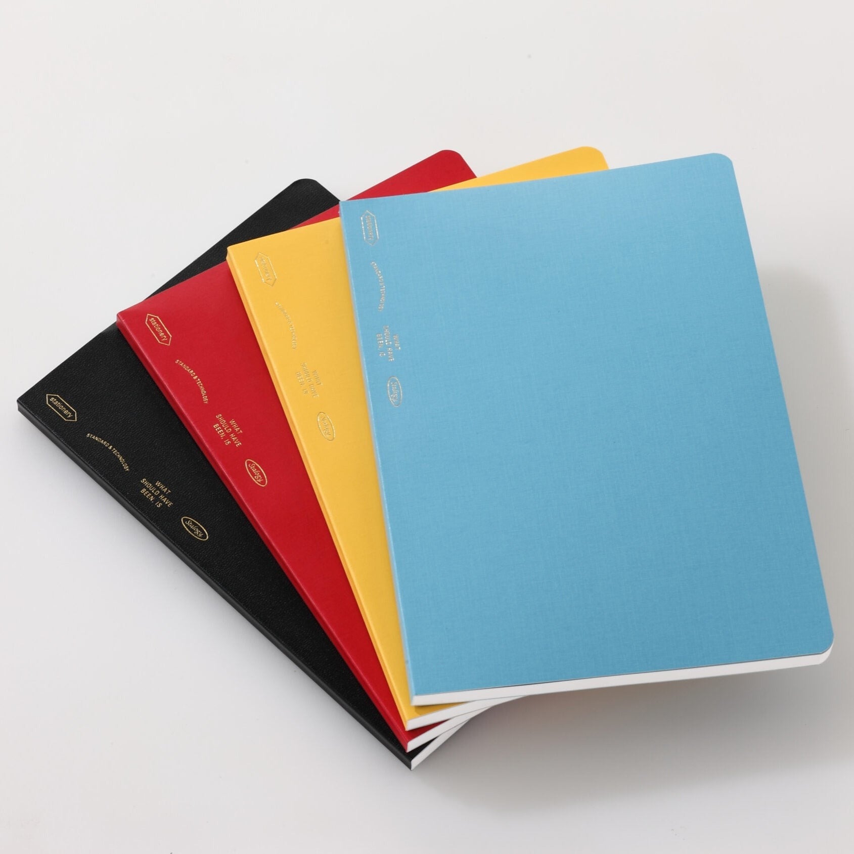 Stalogy Half Year notebooks in A6 size available in black yellow and red
