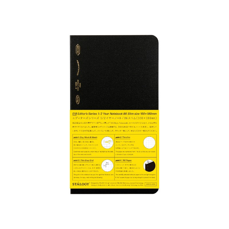Black notebook with yellow label on a white background