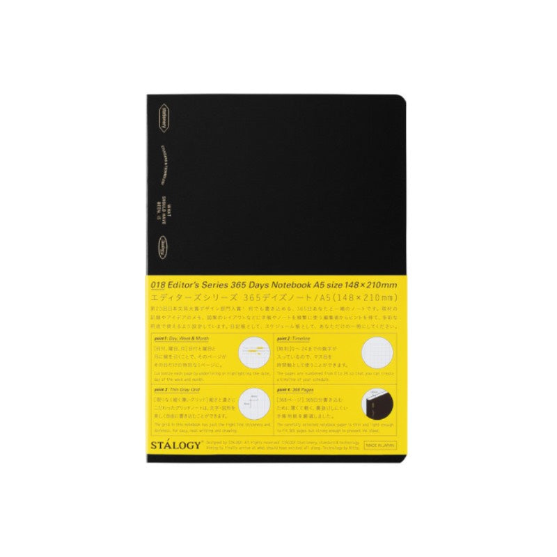 Black notebook with yellow label on a white background