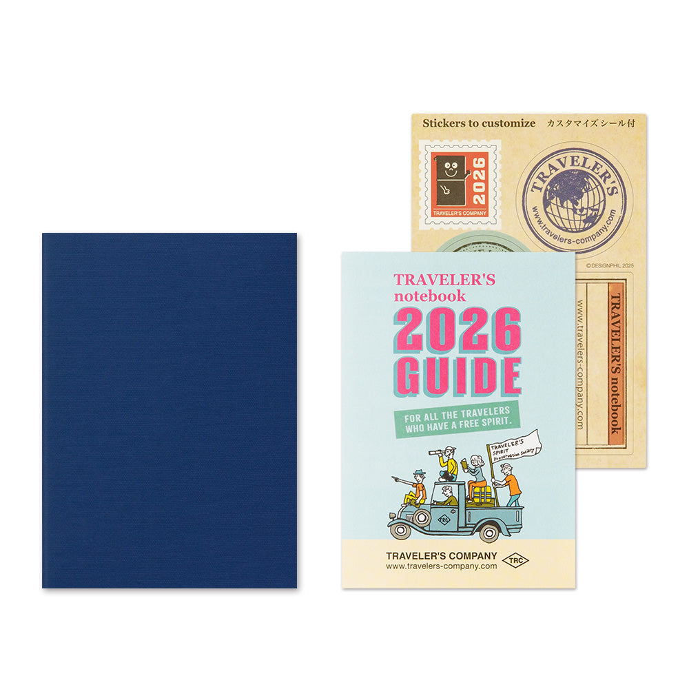Traveler's notebook 2026 guide with a blue cover and colorful front cover on a white background