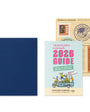 Traveler's notebook 2026 guide with a blue cover and colorful front cover on a white background