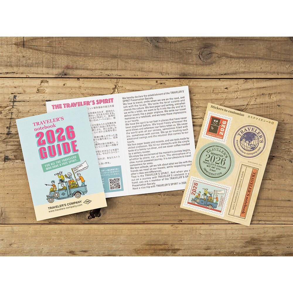 Traveler's Company 2026 Guidebook and accessories on a wooden surface