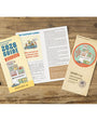 2026 guide and travel notebook on a wooden surface