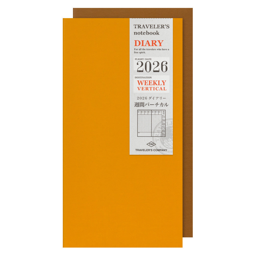 Orange notebook with a label indicating '2026' on a white background
