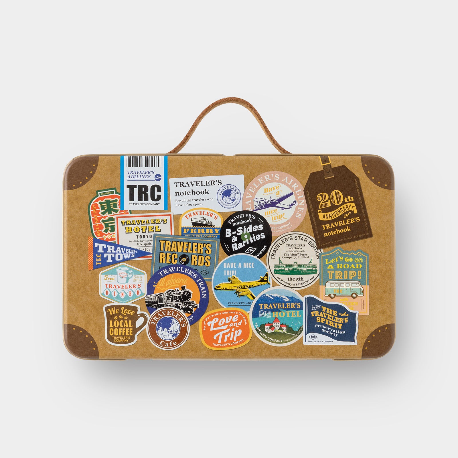 Brown suitcase with various travel-themed stickers on a white background