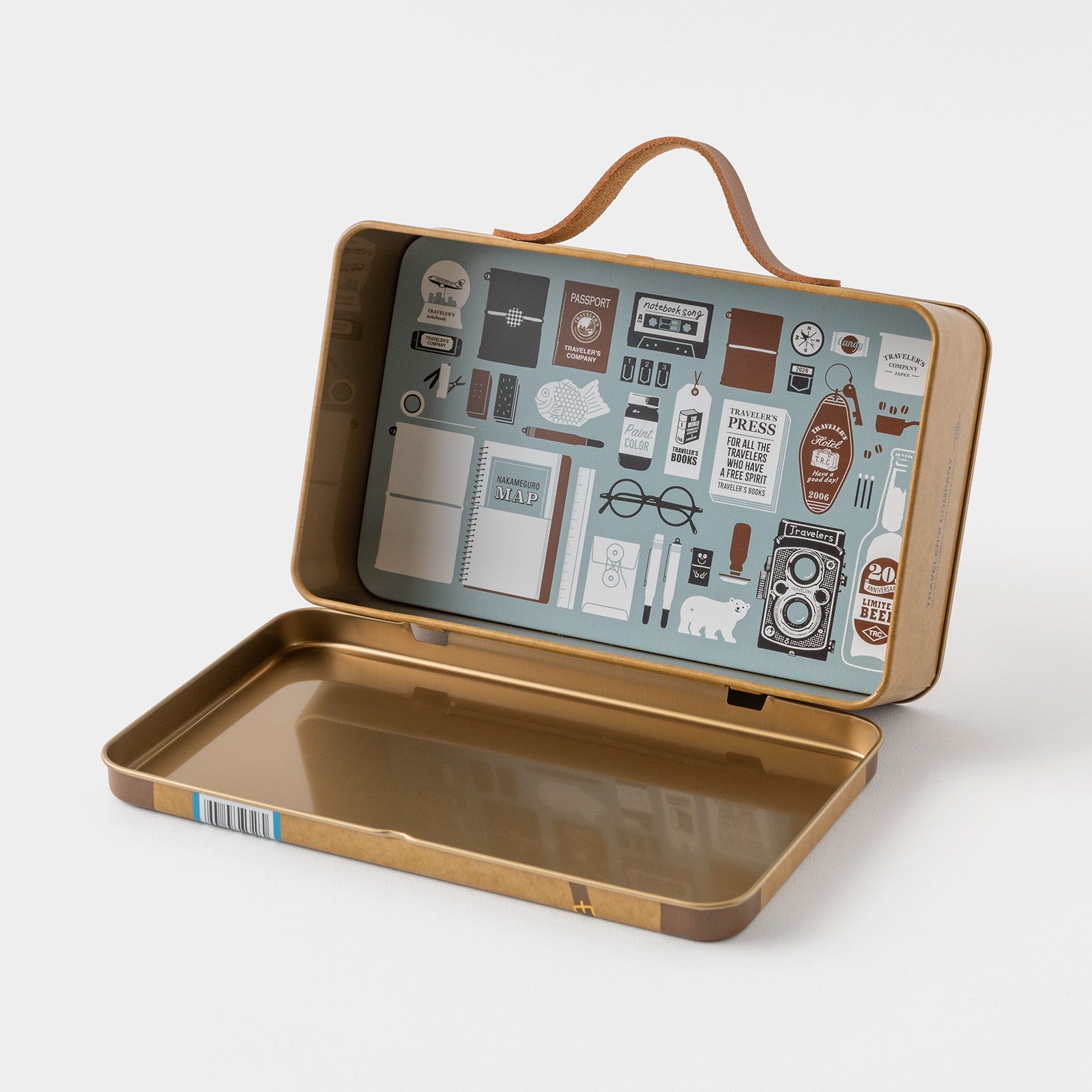 Open tin case with decorative interior on a white background