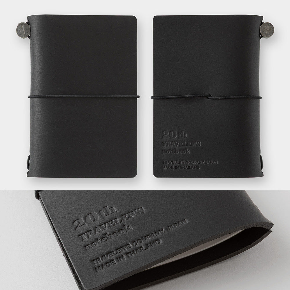 Black leather notebook with '20th Traveler's notebook' embossed on it, shown from different angles.