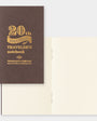 Brown notebook with gold text '20th Anniversary Traveler's notebook' on a white background