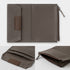 Brown fabric wallet with zipper on a white background
