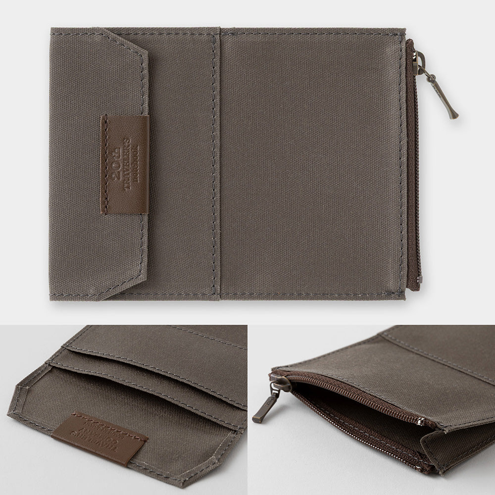 Brown fabric wallet with zipper on a white background