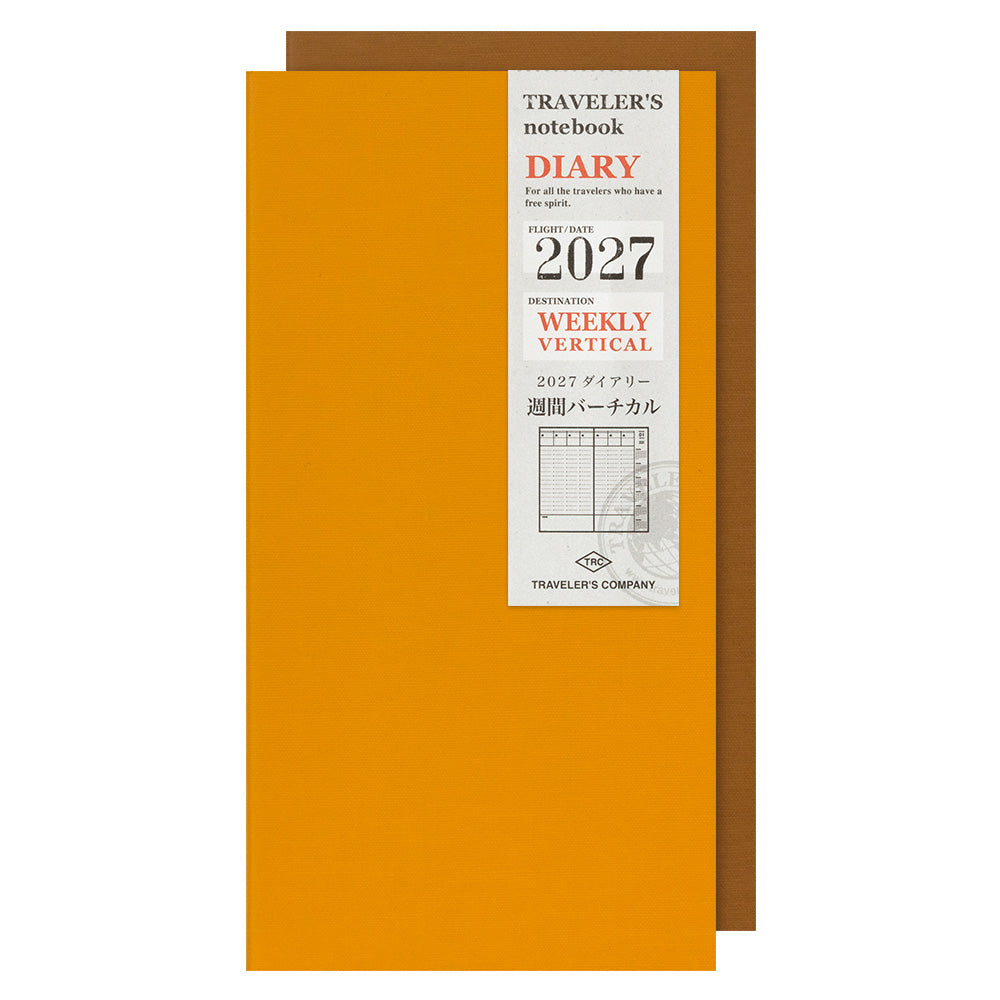 An orange weekly vertical planner notebook with a brown envelope, featuring a white label on the front with text for 'Traveler's notebook DIARY 2027' and Japanese text.