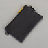 Black drawstring pouch on a gray background