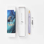Fountain pen with packaging and ink cartridge on a white background