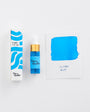Blue ink bottle and packaging with a swatch on a white background