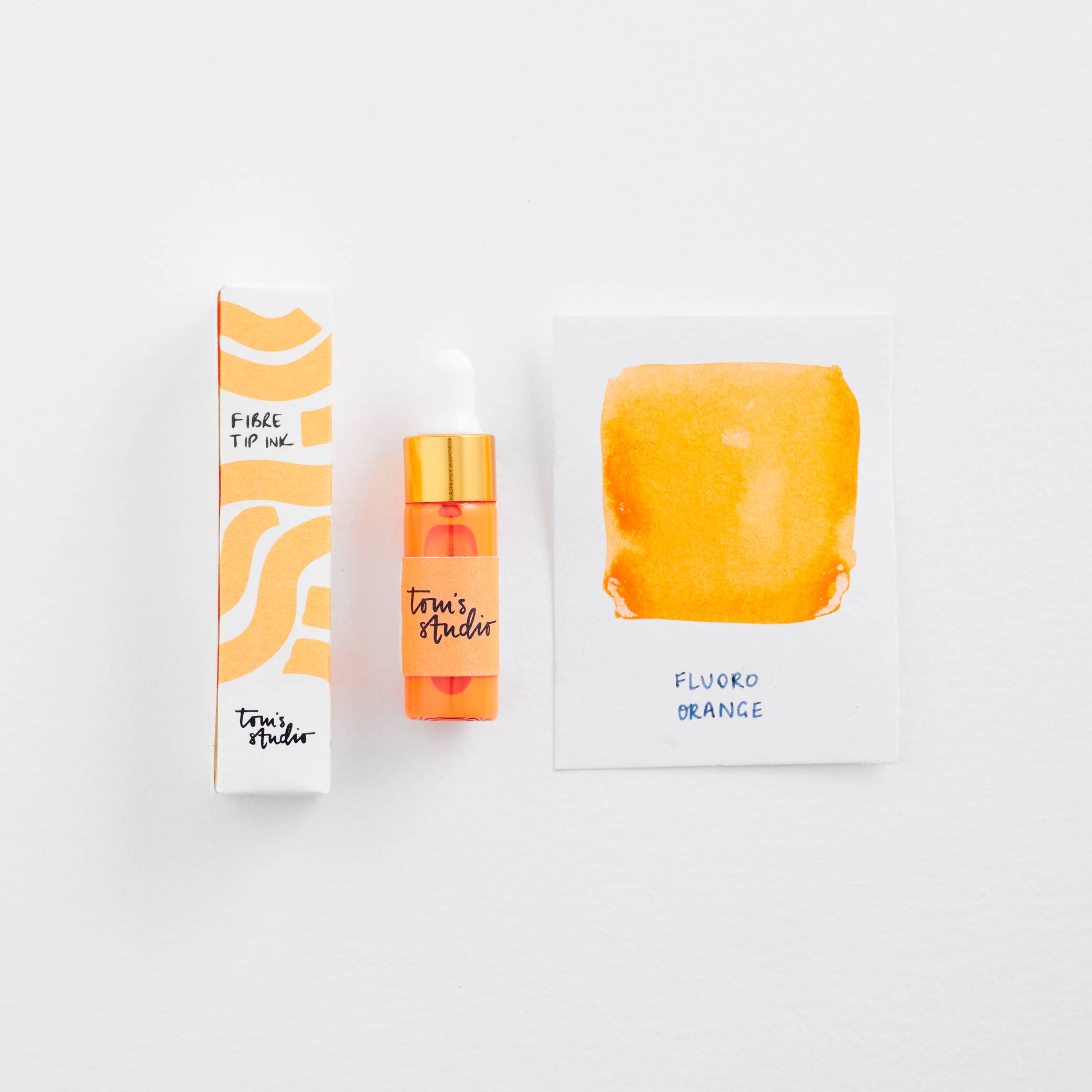 Fluoro orange product with packaging and color swatch on a white background