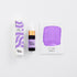 Purple ink product with packaging and color swatch on a white background