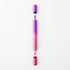 Purple and pink pen on a white background
