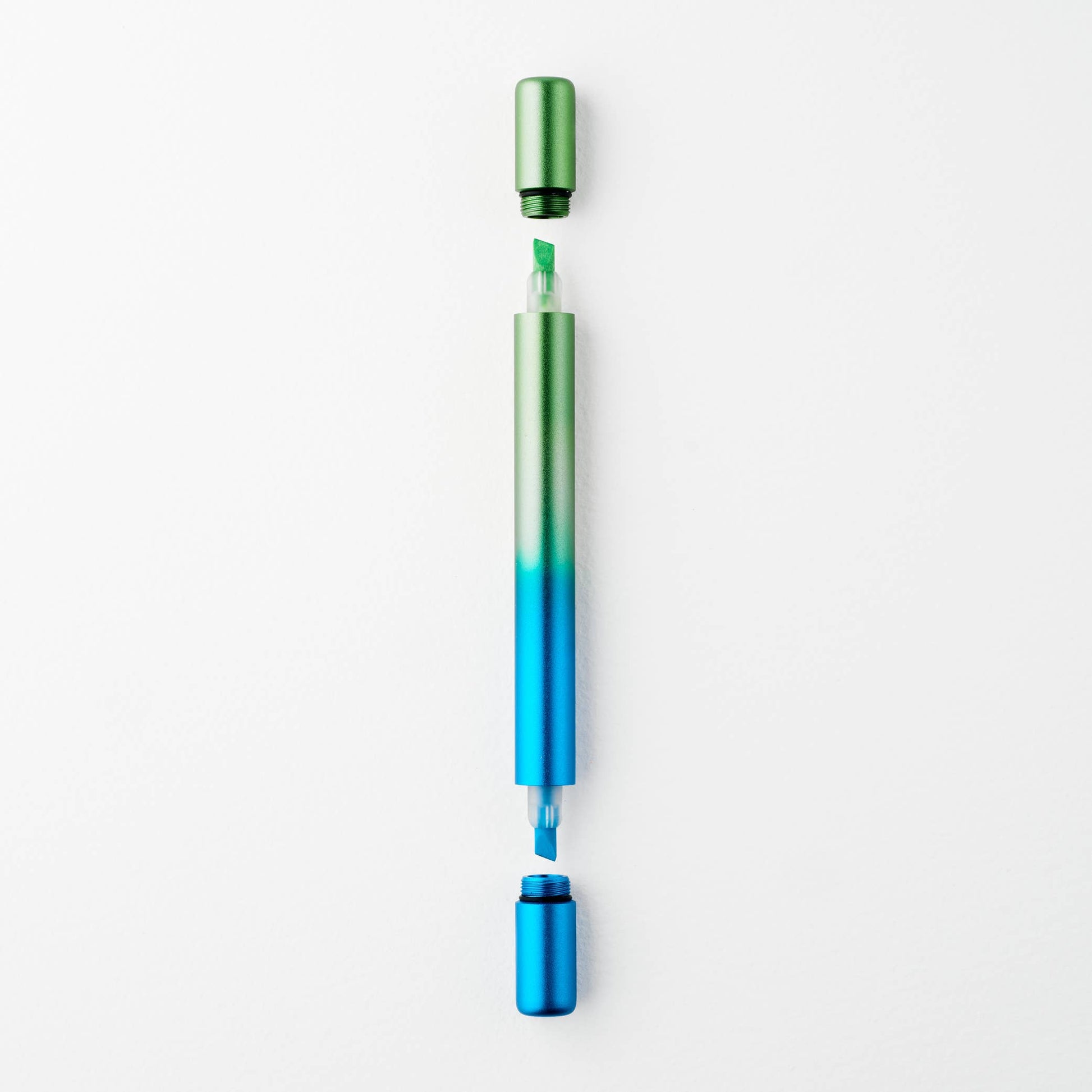 Colorful pen with gradient design on a white background