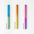 Three gradient-colored pens on a white background