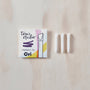 Toni's Studio highlighter tip packaging with three white tips on a wooden surface