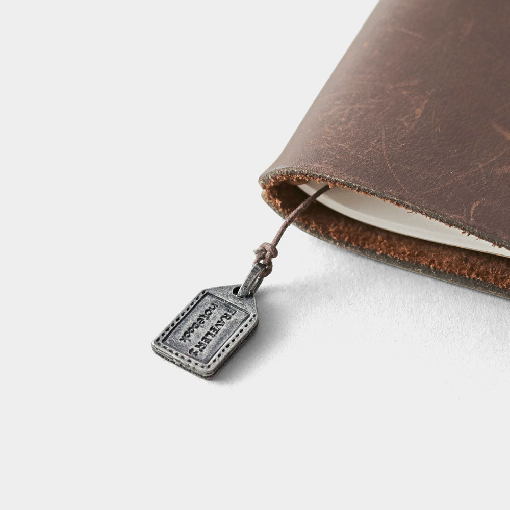 Traveler’s Factory Charm - Tag