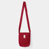 Red shoulder bag on a white background