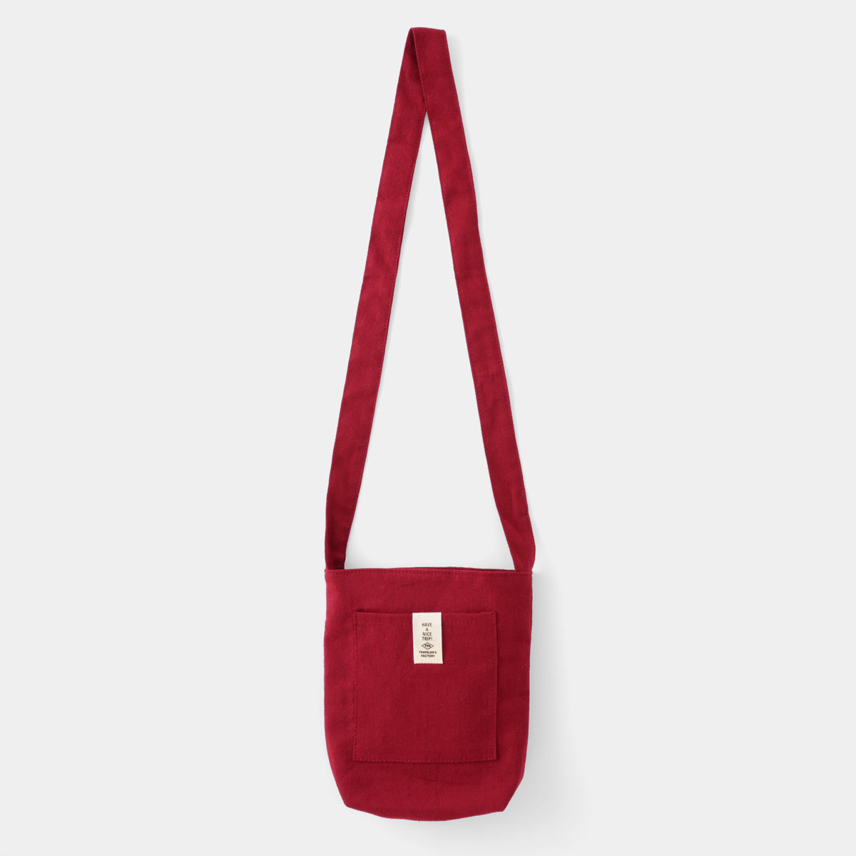 Red shoulder bag on a white background