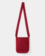 Red shoulder bag on a white background