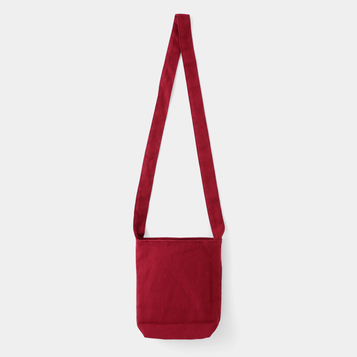 Red shoulder bag on a white background